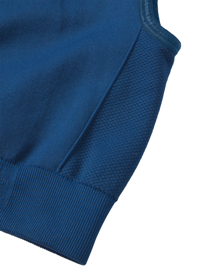 Detailed view of PB5star's astral blue Compression Knit Sports Bra, focusing on the snug ribbed hem and textured fabric, perfect for pickleball athletes seeking style and high-performance support.