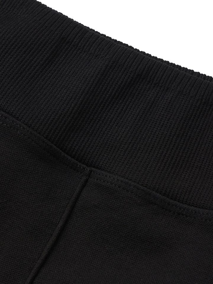 Close-up of the high-quality fabric and stretch waistband of PB5star's women's black Compression Shorts, emphasizing the durable construction and comfort for optimal pickleball performance.