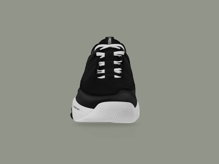 Front view of black and white PB5star Court2 sneaker showcasing a breathable mesh upper, durable toe cap, and modern design.