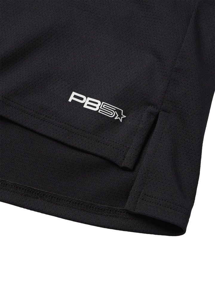 Detail of PB5Star logo on a black Cropped Racer Back Tank highlighting the quality and texture of the sportswear fabric.