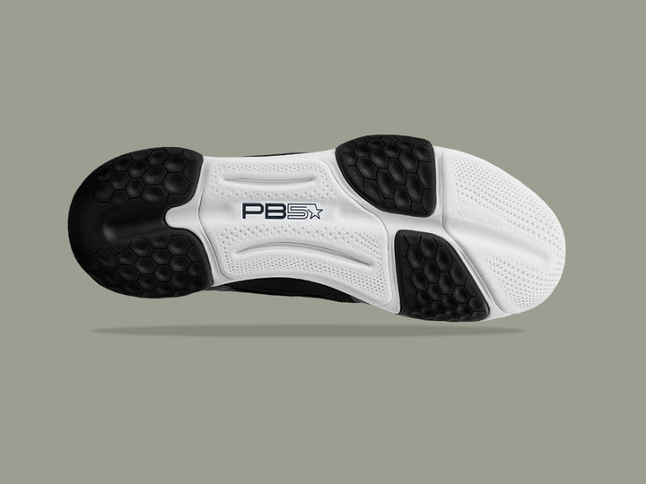 Bottom view of PB5 Court2 pickleball shoe showcasing multi-zoned high-abrasion non-marking rubber outsole with dynamic tread pattern for enhanced grip and stability.