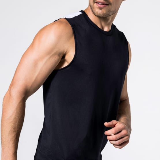 Close up of male athlete wearing PB5star black Vented Sleeveless Tee, showcasing a comfortable and breathable fit for activewear.