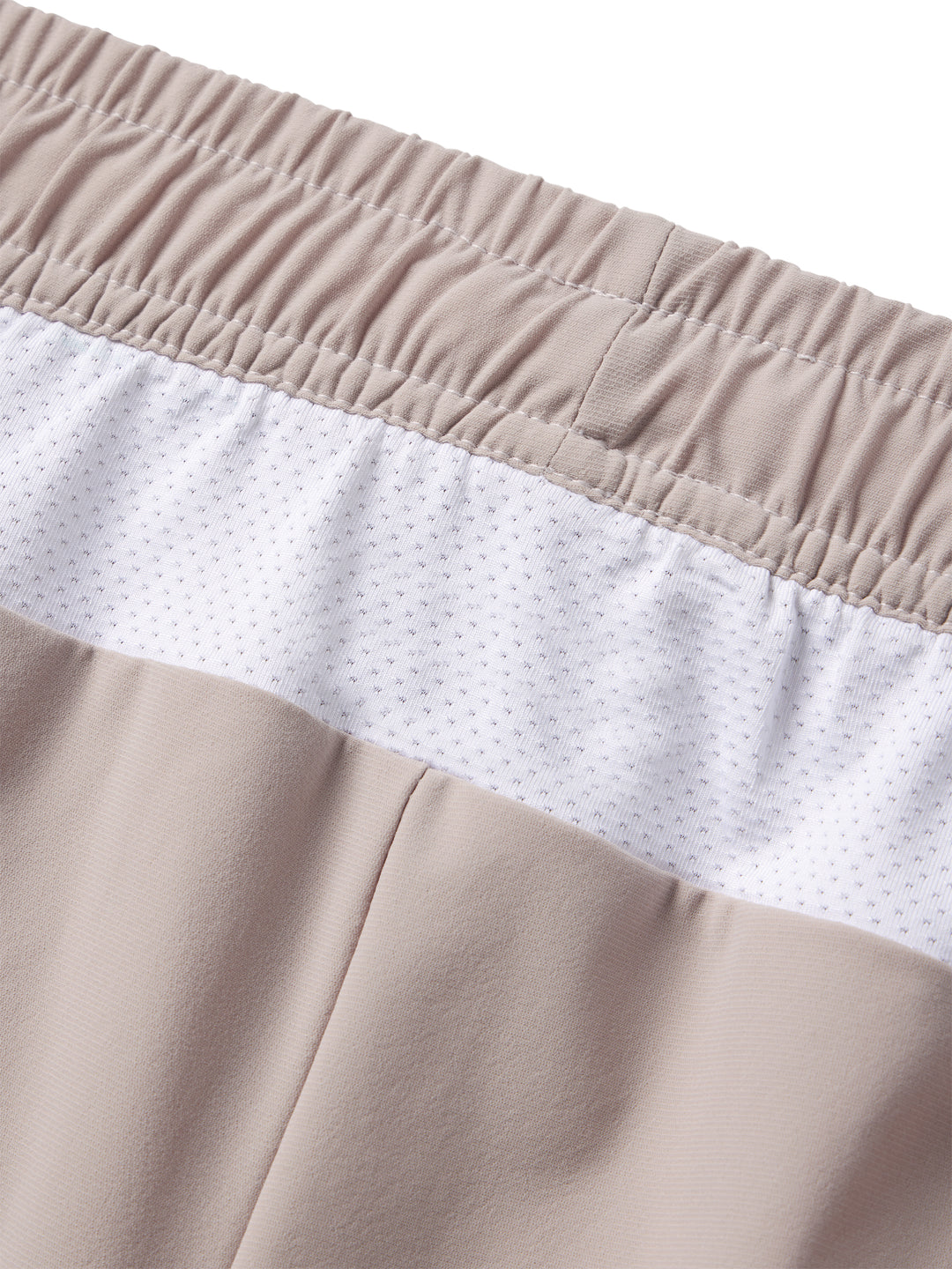 Detail of PB5star women's Vented Court Short with a comfortable elastic waistband and breathable white mesh detail.