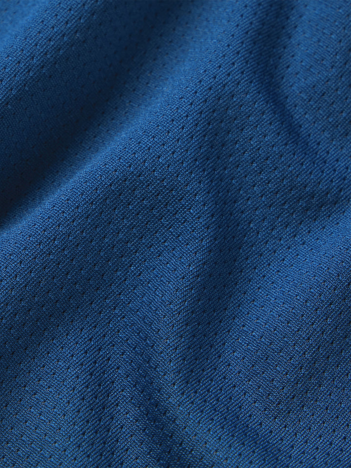 Texture close-up of the astral blue moisture-wicking fabric of PB5star's Women's Vented Court Tee.