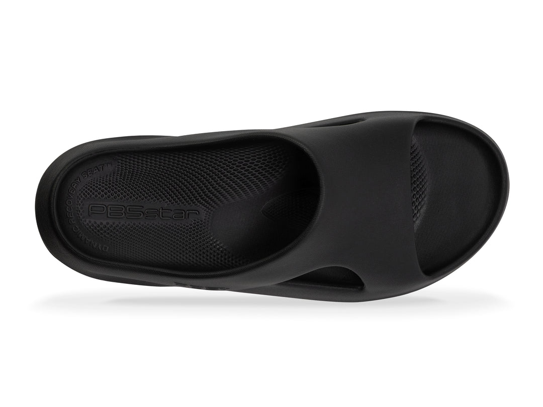 Top view of the women's black PB5star Après Sport recovery slide featuring an ergonomic design and textured sole for post-workout comfort and support.