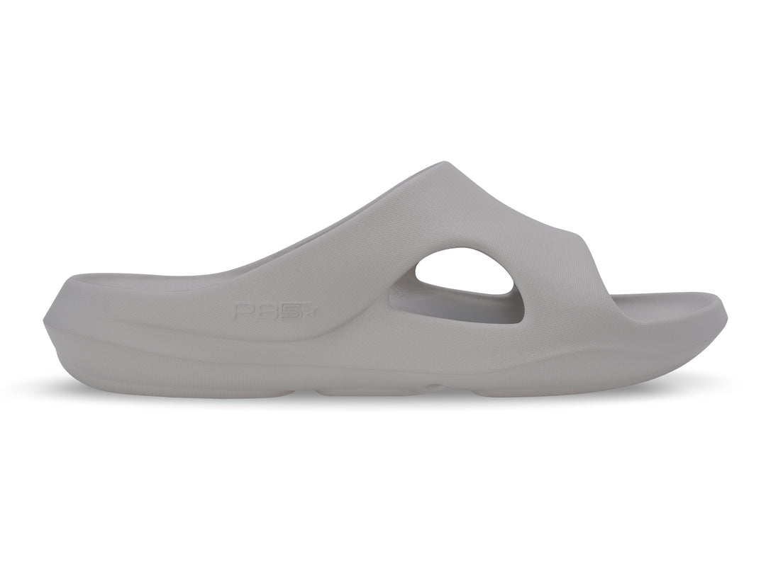 Side view of the women's titanium PB5star Après Sport recovery slide showcasing a lightweight, ergonomic design with superior arch support for post-activity recovery.