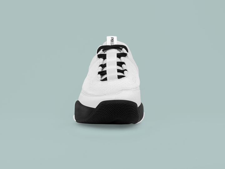 Front view of the PB5 Court2 white athletic shoe with PB5star branding, featuring black laces, breathable material, and durable black outsole.