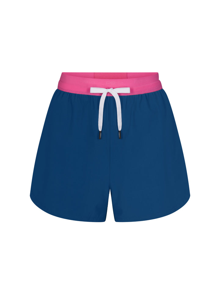 Women's Signature Court Short in astral blue with pink waistband with white drawstring.