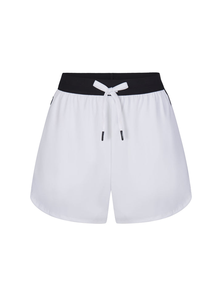 Women's Signature Court Short in white with black waistband with white drawstring.